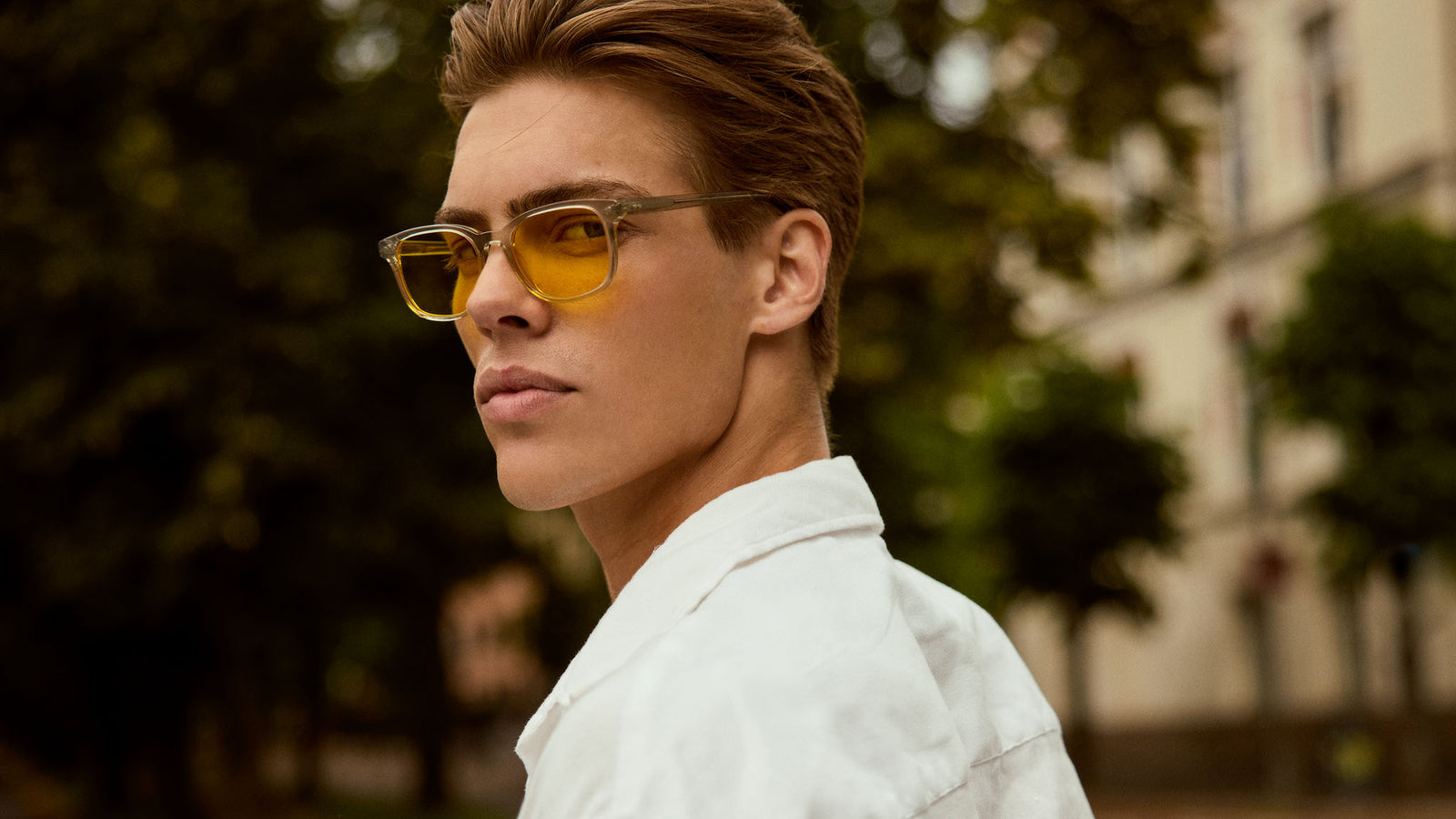 Man wearing Filter Optix blue light glasses that filter out the most harmful artificial blue light, for boosting mood and improving health